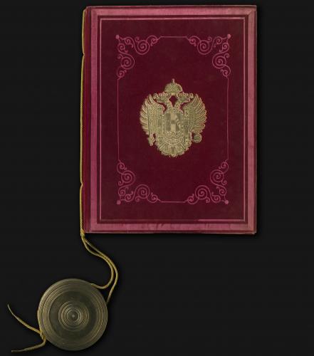 Nobilitační listina Friedricha Emila Schindlera von Kunewald, 1858, papír, v červených sametových deskách, v plechovém obalu, pečeť, zlaceno, 19×38 cm, obal  31×54 cm, Muzeum Novojičínska – zámek Kunín
