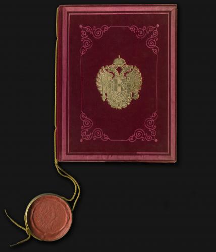 Nobilitační listina Friedricha Emila Schindlera von Kunewald, 1858, papír, v červených sametových deskách, v plechovém obalu, pečeť, zlaceno, 19×38 cm, obal  31×54 cm, Muzeum Novojičínska – zámek Kunín